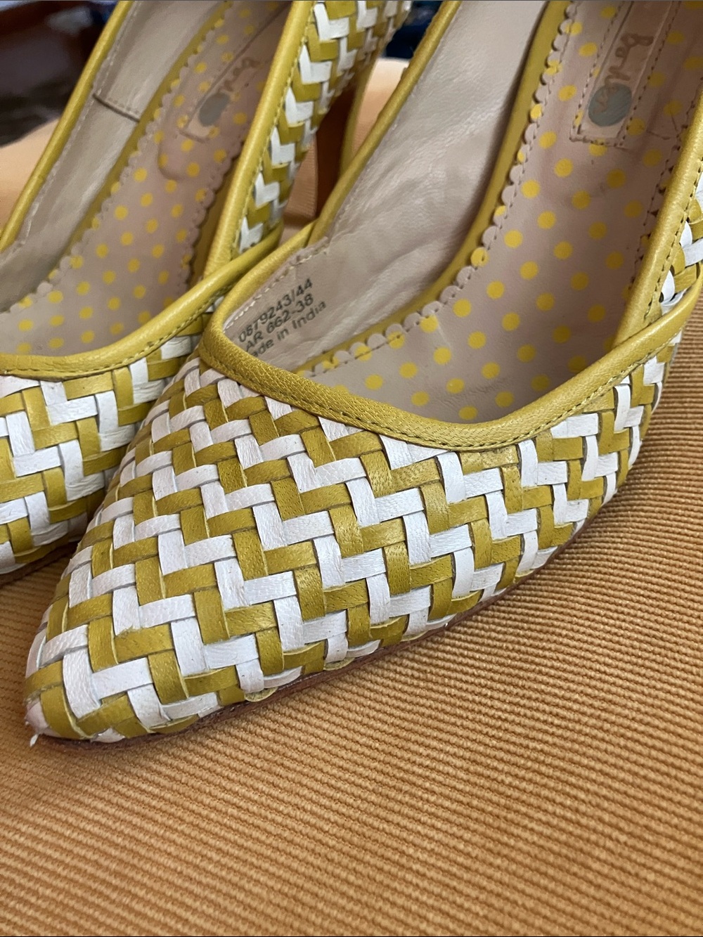 Biden yellow and white woven pumps
